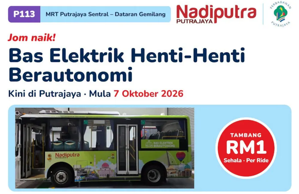 An electric bus at an urban bus stop