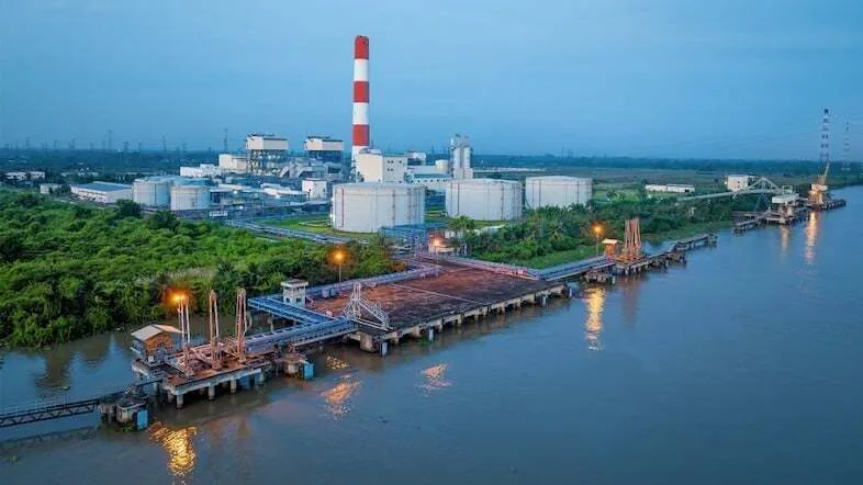 Industrial turbines and pipework at a power generation facility